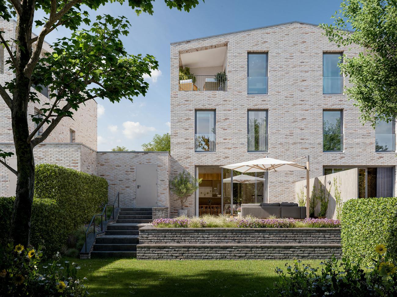 Gartenansicht mit Terrasse, Staudenpflanzung und Natursteinmauern